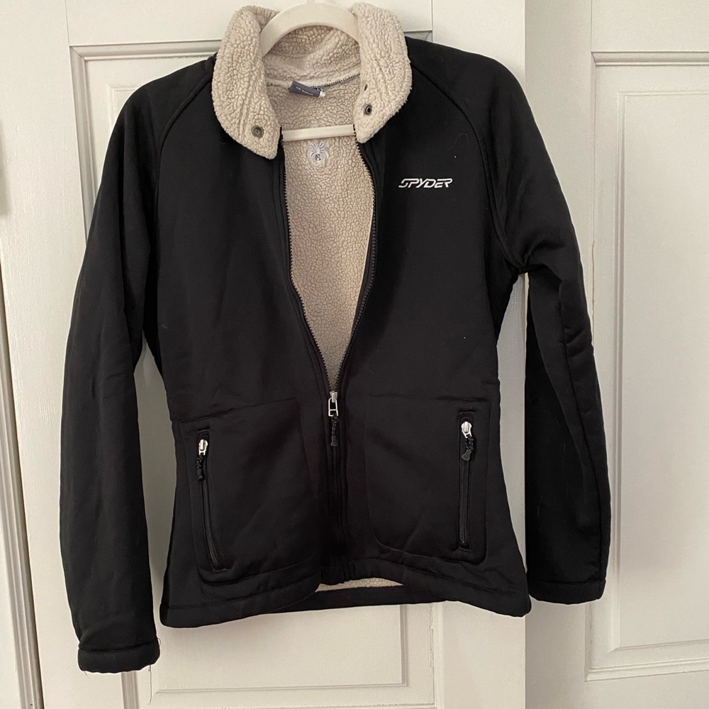 Beautiful spyder fleece with faux shearling. 100% polyester.